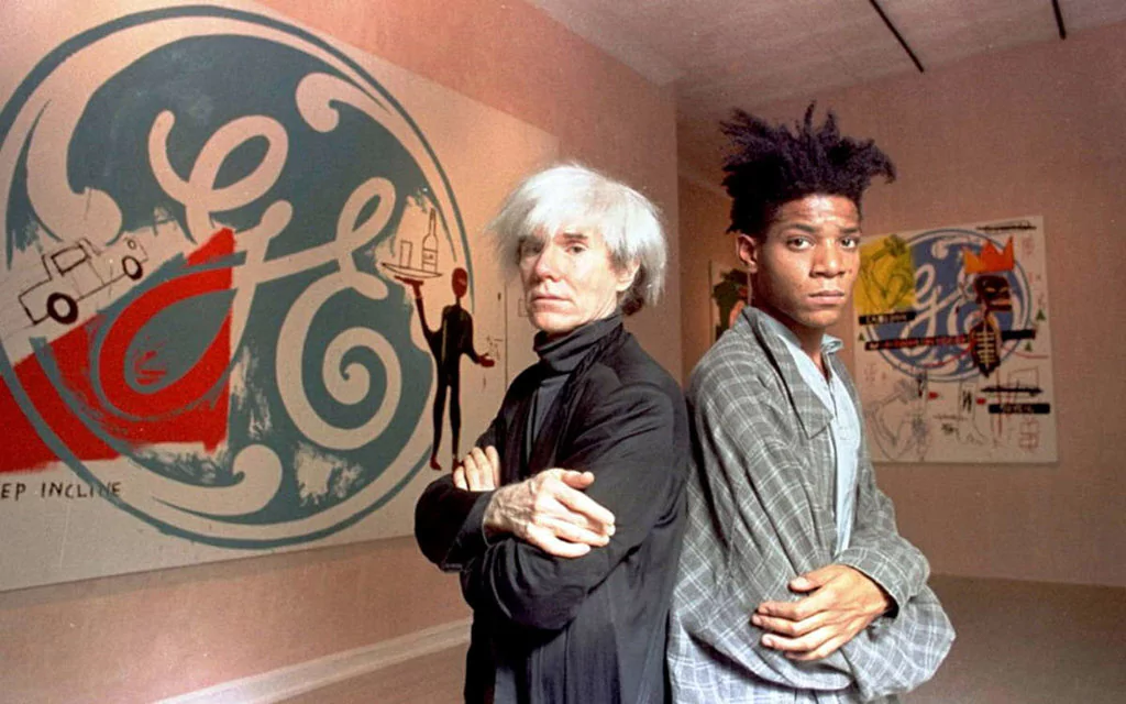 Andy Warhol next to Jean Michel Basquiat